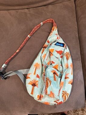Kavu Mint Sling Bag with Orange Palm Print